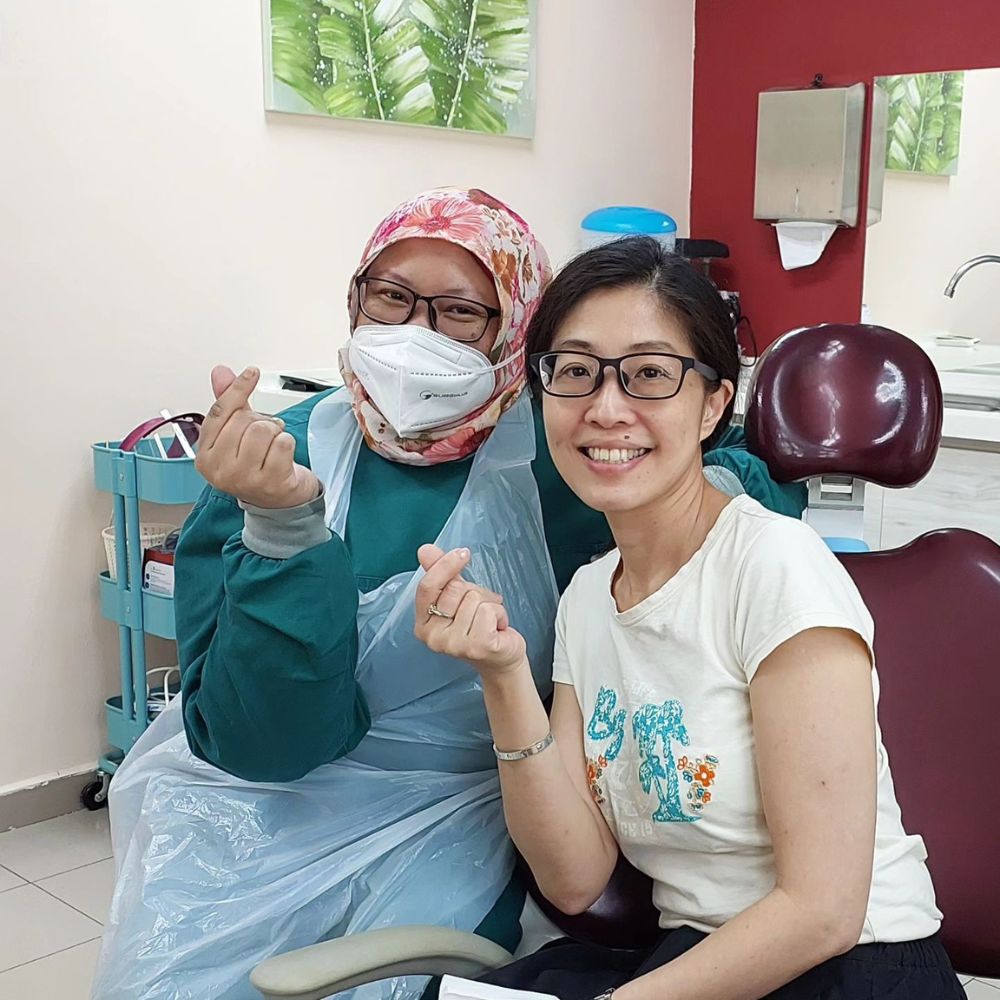 dentist smiling patient at Klinik Pergigian ADL, Petaling Jaya Dental Clinic