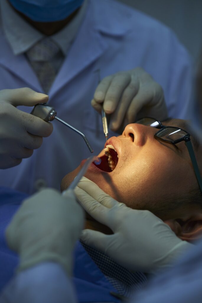 Dentists Doing Dental Surgery